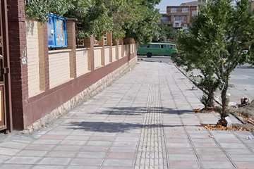 اجرای عملیات جدول گذاری و کف فرش پیاده رو خبابان فدائیان اسلام با هدف تسهیل در تردد عابرین پیاده
